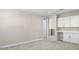 Spacious bonus room with built-in cabinetry and carpeting at 2320 W Moody Trl, Phoenix, AZ 85041