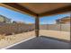 Covered patio overlooks a large, sunny backyard at 25838 W Samantha Way, Buckeye, AZ 85326