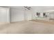 Spacious living room with carpeted floors and open floor plan at 25838 W Samantha Way, Buckeye, AZ 85326