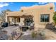 Spacious backyard with patio furniture and fire pit at 27608 N Montana Dr, Rio Verde, AZ 85263