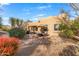 Landscaped backyard with patio, seating, and desert plants at 27608 N Montana Dr, Rio Verde, AZ 85263