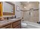 Bathroom features a vanity, bathtub, and glass-enclosed shower at 27608 N Montana Dr, Rio Verde, AZ 85263