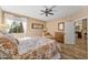 Spacious bedroom with large window and sitting area at 27608 N Montana Dr, Rio Verde, AZ 85263