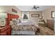 Serene bedroom featuring a king-size bed and window seat at 27608 N Montana Dr, Rio Verde, AZ 85263