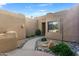 Private courtyard with flagstone path and desert plants at 27608 N Montana Dr, Rio Verde, AZ 85263