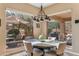 Bright dining area with large windows and backyard view at 27608 N Montana Dr, Rio Verde, AZ 85263