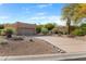 Desert landscape and single-story home with attached garage at 27608 N Montana Dr, Rio Verde, AZ 85263