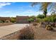 Attractive curb appeal with desert landscaping and driveway at 27608 N Montana Dr, Rio Verde, AZ 85263