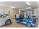 Two-car garage with ample storage space and golf cart at 27608 N Montana Dr, Rio Verde, AZ 85263