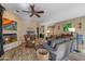 Relaxing living room with a cozy fireplace and seating area at 27608 N Montana Dr, Rio Verde, AZ 85263