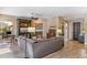 Bright living room, featuring hardwood floors and built-in shelving at 27608 N Montana Dr, Rio Verde, AZ 85263