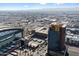 Overhead shot showing a modern condo building with views of the city and stadium at 310 S 4Th St # 908, Phoenix, AZ 85004