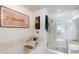 Bright bathroom featuring a soaking tub, glass enclosed shower, and modern design at 310 S 4Th St # 908, Phoenix, AZ 85004
