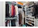 Organized walk-in closet with shelving and hanging space for clothes, shoes, and accessories at 310 S 4Th St # 908, Phoenix, AZ 85004