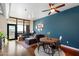 Bright living room with a blue accent wall, hardwood floors, and a comfortable gray sectional, creating a cozy space at 310 S 4Th St # 908, Phoenix, AZ 85004