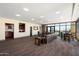 Spacious lounge area with a kitchenette, comfortable seating and city views at 310 S 4Th St # 908, Phoenix, AZ 85004