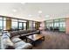 Spacious lounge area featuring comfortable seating and floor to ceiling windows at 310 S 4Th St # 908, Phoenix, AZ 85004
