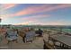 Charming patio features cozy seating around a fire pit, offering breathtaking mountain views and serene outdoor enjoyment at 310 S 4Th St # 908, Phoenix, AZ 85004