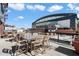 Beautiful roof deck featuring dining tables and stadium views at 310 S 4Th St # 908, Phoenix, AZ 85004