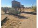 Elevated playhouse in backyard at 32297 W Trading Post Rd, Maricopa, AZ 85138