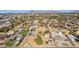 Aerial view of neighborhood, showing a house under construction and surrounding homes at 3312 E Flower St, Phoenix, AZ 85018