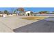 Backyard with gravel, grass, and detached garage at 3312 E Flower St, Phoenix, AZ 85018
