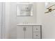 Bathroom with white vanity and a large mirror at 3312 E Flower St, Phoenix, AZ 85018