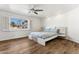 Bright bedroom with wood floors and a ceiling fan at 3312 E Flower St, Phoenix, AZ 85018