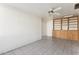 Bonus room with built-in shelving and tile floors at 3312 E Flower St, Phoenix, AZ 85018