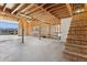 Unfinished garage interior with loft area at 3312 E Flower St, Phoenix, AZ 85018