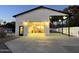 Detached garage with covered patio and lights at 3312 E Flower St, Phoenix, AZ 85018