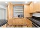 Kitchen pantry with shelving and microwave at 3312 E Flower St, Phoenix, AZ 85018