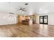 Open concept kitchen with island and stainless steel appliances at 3312 E Flower St, Phoenix, AZ 85018