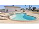 Inviting kidney-shaped pool with spa and patio area at 3312 E Flower St, Phoenix, AZ 85018