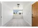 Bright sunroom with tile floors and large windows at 3312 E Flower St, Phoenix, AZ 85018