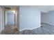 Hallway with gray walls and wood-look floors at 3515 W St Moritz Ln, Phoenix, AZ 85053