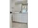 Modern bathroom with white cabinets and quartz countertops at 3957 E Expedition Way, Phoenix, AZ 85050