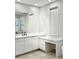 Bathroom with double vanity and quartz countertop at 3957 E Expedition Way, Phoenix, AZ 85050