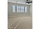 Large bedroom with ceiling fan and window coverings at 3957 E Expedition Way, Phoenix, AZ 85050