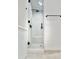 Modern walk-in shower with glass enclosure and bench at 3957 E Expedition Way, Phoenix, AZ 85050