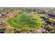 Aerial view of a manicured golf course in a residential community at 41007 N Harbour Town Way, Anthem, AZ 85086