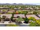 Single-story home with tile roof in a mountain community at 41007 N Harbour Town Way, Anthem, AZ 85086