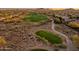 Aerial view showcasing the golf course and community at 41007 N Harbour Town Way, Anthem, AZ 85086