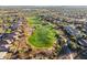 Aerial view of a golf course and surrounding houses at 41007 N Harbour Town Way, Anthem, AZ 85086