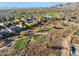 Community overview with golf course and desert landscape at 41007 N Harbour Town Way, Anthem, AZ 85086