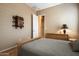 Cozy bedroom with wood floors and built-in shelving at 41007 N Harbour Town Way, Anthem, AZ 85086