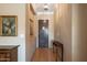Interior entryway with hardwood floors and an elegant door at 41007 N Harbour Town Way, Anthem, AZ 85086