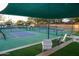 Spacious pickleball courts with shade covers and lounge seating at 41007 N Harbour Town Way, Anthem, AZ 85086