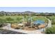Modern playground with shade structures at 41007 N Harbour Town Way, Anthem, AZ 85086