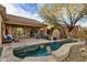 Inviting pool area with a spa and spacious patio at 41007 N Harbour Town Way, Anthem, AZ 85086